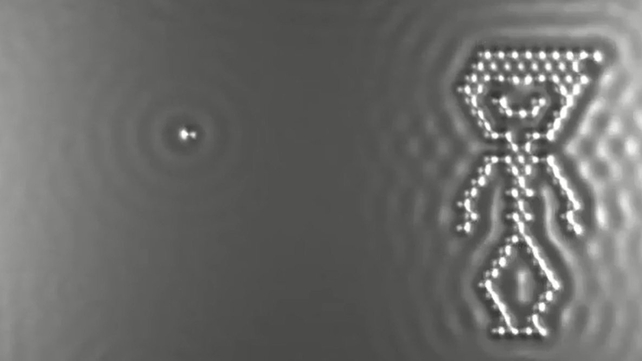 Indvidual carbon monoxide molecules are repeatedly rearranged to show a boy dancing, throwing a ball and bouncing on a trampoline Indvidual carbon monoxide molecules are repeatedly rearranged to show a boy dancing, throwing a ball and bouncing on a trampoline