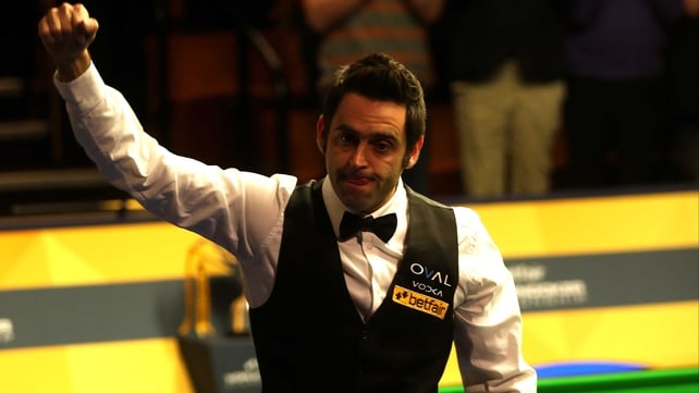 Ronnie O'Sullivan punches the air in delight after comfortably seeing off the challenge of Judd Trump