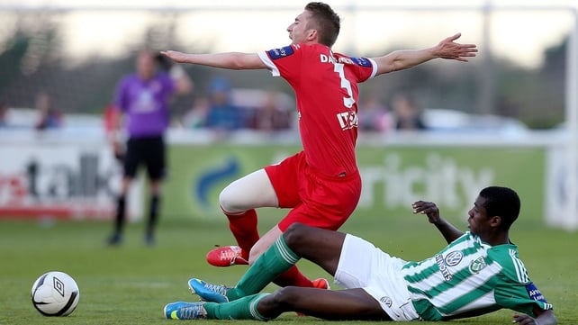Ismahil Akinade of Bray tackles Iarfhlaith Davoren of Sligo Rovers