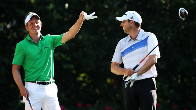 Leader Sergio Garcia (right) shares a joke with Luke Donald during the second round at Sawgrass