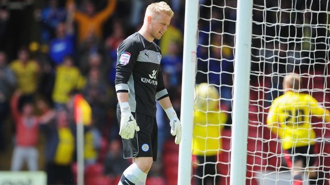 Kasper Schmeichel dejected after the first Watford goal