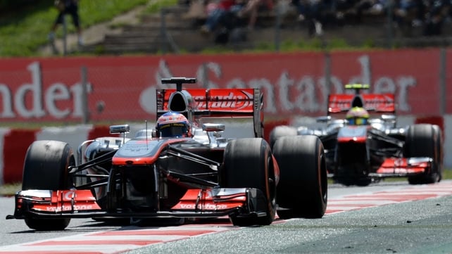 Jenson Button leads team-mate Sergio Perez at Barcelona's Circuit de Catalunya