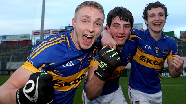 Kevin Fahey, Colin O'Riordan and Luke Boland celebrate after the game
