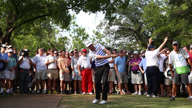 Keegan Bradley takes a shot on the 18th hole