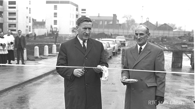 Minister Kevin Boland cuts the ribbon but who is the man with him?