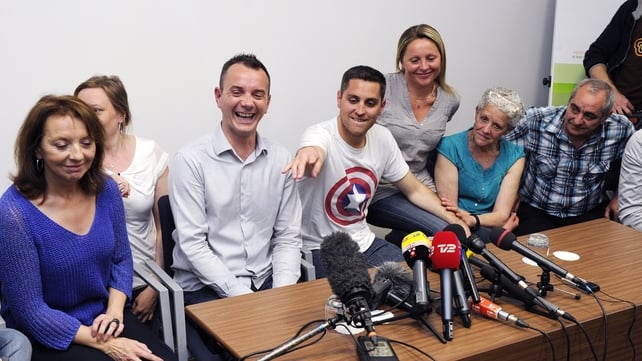 Vincent Aubin and Bruon Boileau (centre) are the first couple to marry under France's new law Vincent Aubin and Bruon Boileau (centre) are the first couple to marry under France's new law