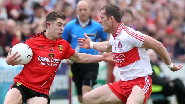 Down produced a brilliant second-half performance to see off Derry's challenge in Celtic Park