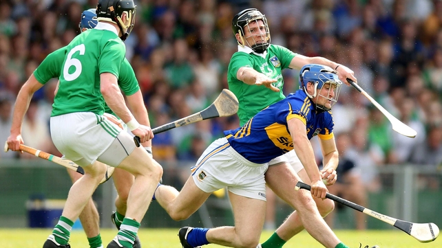 Tipperary's Pa Bourke with Wayne McNamara and Donal O'Grady of Limerick