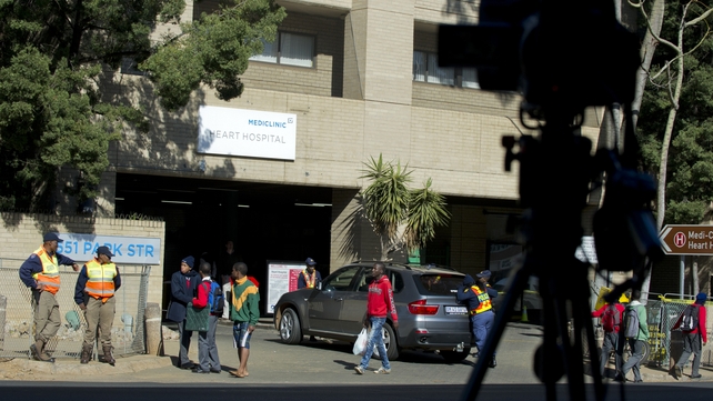 Police officers stand guard outside the hospital where Nelson Mandela is being treated Police officers stand guard outside the hospital where Nelson Mandela is being treated