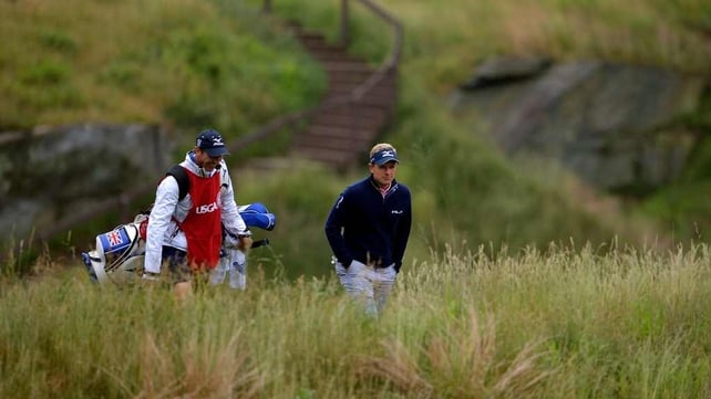 Luke Donald slumped in the closing stages of his round