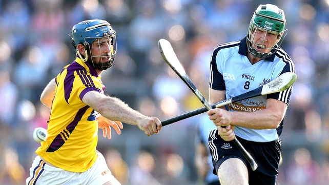 Garrett Sinnott of Wexford and Dublin's John McCaffrey clash in Wexford Park
