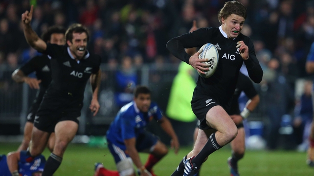 Beauden Barrett heads for the try line for New Zealand
