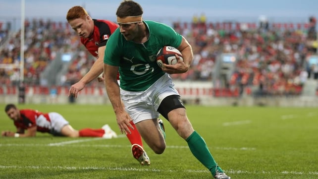 Fergus McFadden scores one of his three tries against Canada