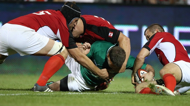 Fergus McFadden manmages to touch down despite Canadian efforts