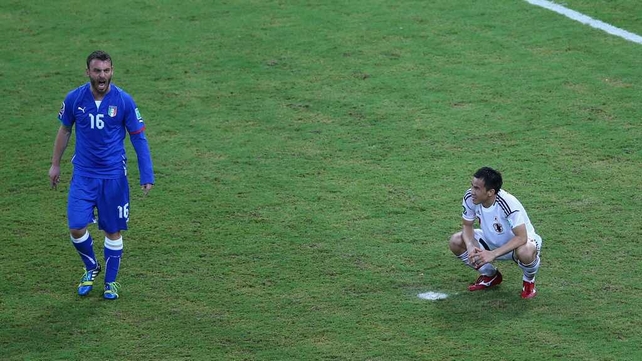 Shinji Okazaki of Japan looks dejected as Japan were beaten despite leading 2-0 at one stage