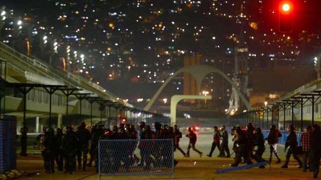 Anti riot police officers patrol the landmark Sambadrome in Rio