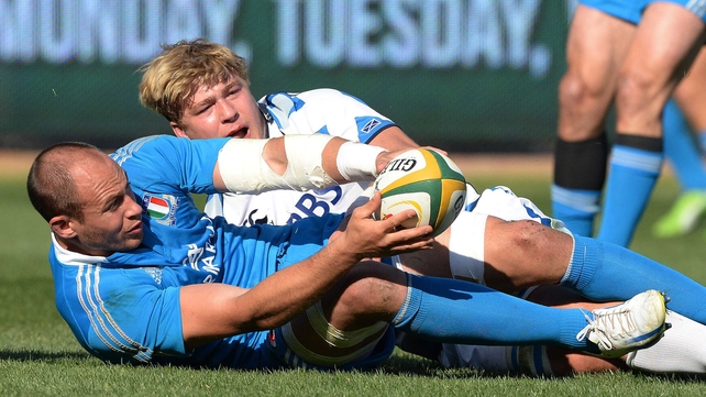 Sergio Parisse of Italy places the ball during the game