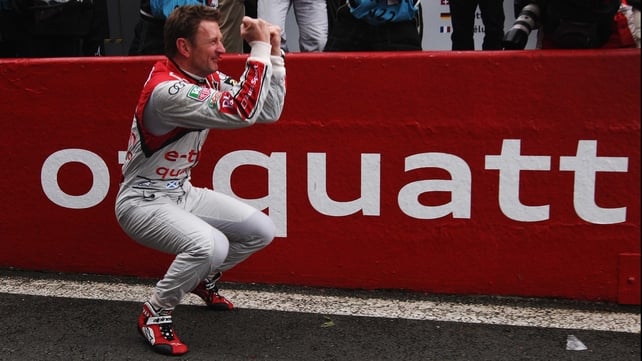 Allan McNish celebrates victory in the Le Mans 24 Hours