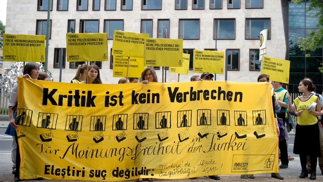 Protesters from Amnesty International gather outside Turkey's embassy in Berlin urging Turkey to respect the right to demonstrate Protesters from Amnesty International gather outside Turkey's embassy in Berlin urging Turkey to respect the right to demonstrate
