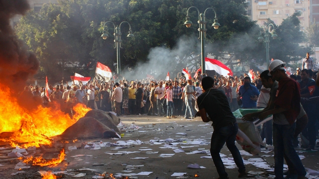 Opponents of Mohammed Mursi burn the content of a Freedom and Justice Party office in the coastal city of Alexandria Opponents of Mohammed Mursi burn the content of a Freedom and Justice Party office in the coastal city of Alexandria