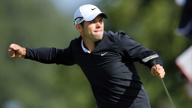 Paul Casey watches his eagle putt on 18 roll into the cup, assuring him victory in the Irish Open