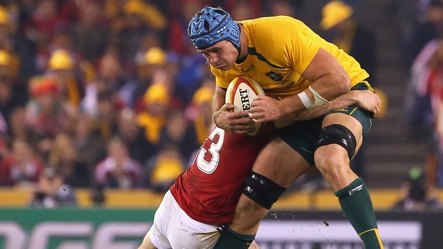 James Horwill attempts to evade a Brian O'Driscoll tackle
