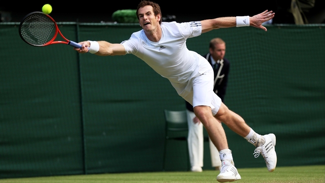 Andy Murray battled back from two sets down to claim a semi-final place