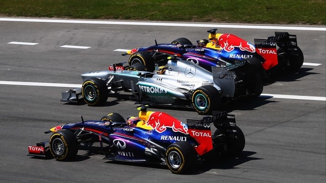 Sebastina Vettel (top) races outside Lewis Hamilton (middle) and Mark Webber