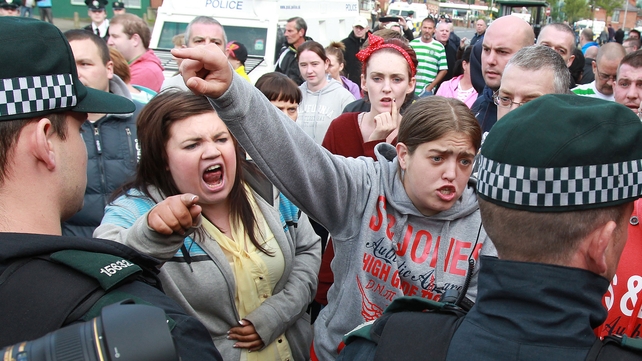 Nationalist protestors clash with police as Orangemen march past the Nationalist Ardoyne shops last year Nationalist protestors clash with police as Orangemen march past the Nationalist Ardoyne shops last year