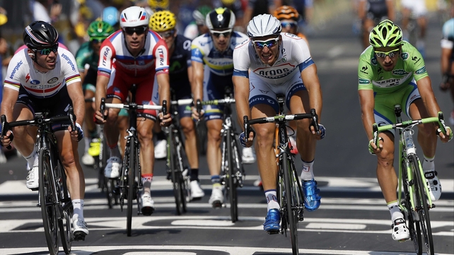 Marcel Kittel (second from right) beats Mark Cavendish (far left) and Peter Sagan (far right) to the line
