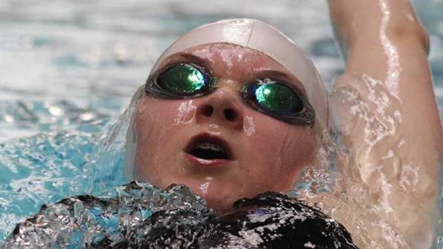 Emma Reid finished ninth in her 100m butterfly heats to qualify for the semis