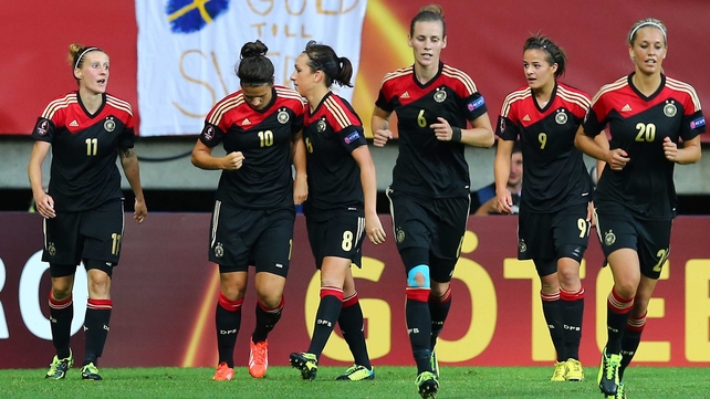 Dzsenifer Marozsan (No 10) celebrates with her team-mates after she scores her team's opening goal during the UEFA Women's Euro 2013 semi-final