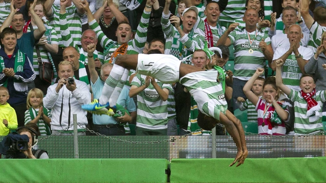 Efe Ambrose celebrates his goal against Cliftonville