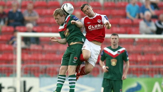 Daryl Horgan of Cork with Greg Bolger of St Pat's