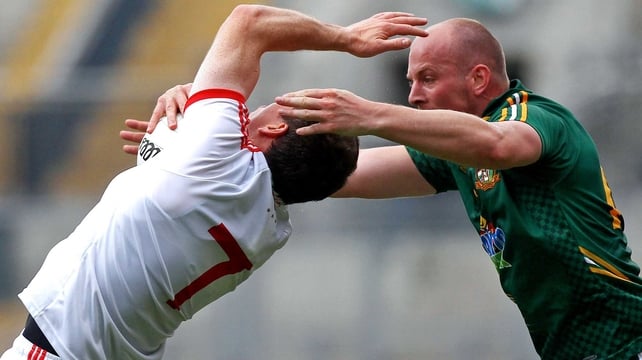 Meath's Joe Sheridan gets to grips with Tyrone's Conor Gormley