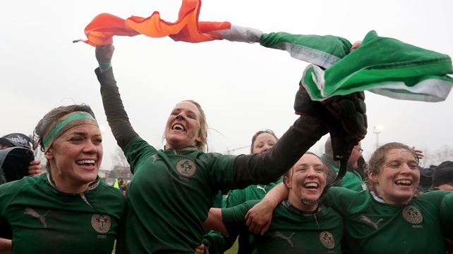 Joy Neville (second from left) celebrates with team-mates following Ireland's grand slam win