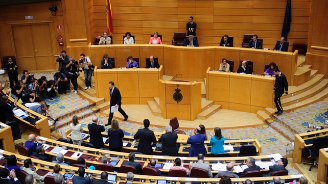 Mariano Rajoy walks away from the podium after speaking at a special session of parliament Mariano Rajoy walks away from the podium after speaking at a special session of parliament