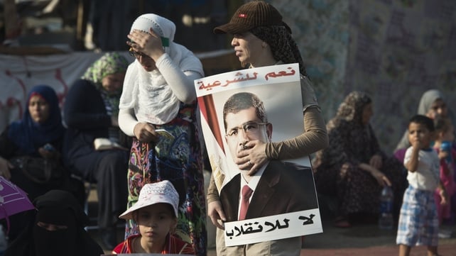 Supporters of Mohammed Mursi attend a rally in Cairo Supporters of Mohammed Mursi attend a rally in Cairo