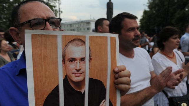 A demonstrator holds up a portrait of Mikhail Khodorkovsky during a rally marking his 50th birthday last June A demonstrator holds up a portrait of Mikhail Khodorkovsky during a rally marking his 50th birthday last June