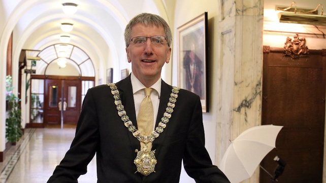 Máirtín Ó Muilleoir had to be escorted from event by the PSNI Máirtín Ó Muilleoir had to be escorted from event by the PSNI