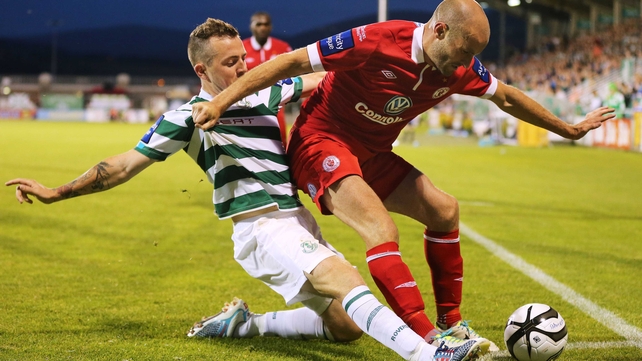 Shamrock Rovers goalscorer Gary McCabe tackles Alan Keane