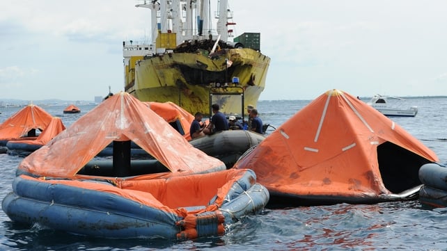 Life rafts from ferry sunk by freighter drift off Philippines coast Life rafts from ferry sunk by freighter drift off Philippines coast