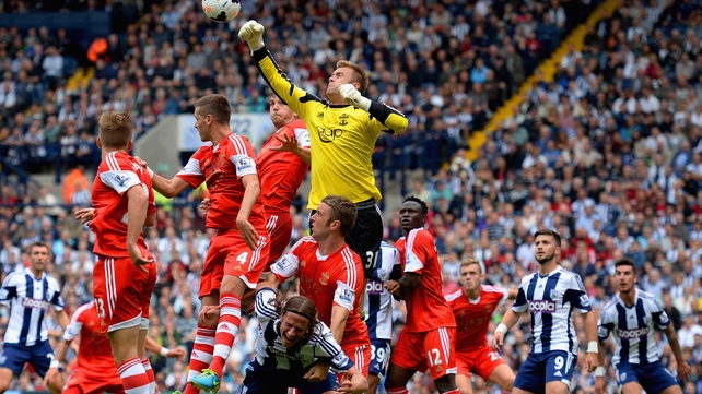 Artur Boruc punches clear in a congested Southampton box