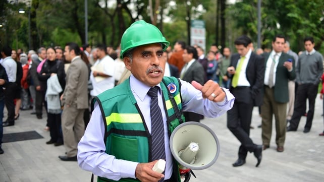 Buildings were evacuated in Mexico City following the earthquake Buildings were evacuated in Mexico City following the earthquake
