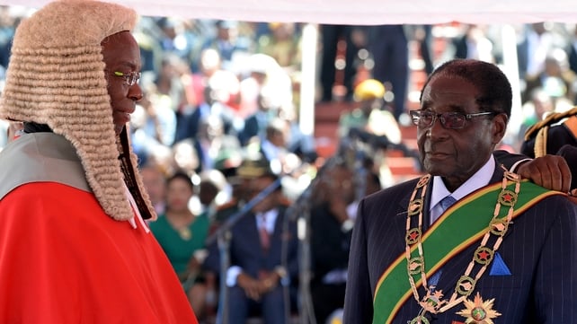 Robert Mugabe took his oath of office before Chief Justice Godfrey Chidyausiku Robert Mugabe took his oath of office before Chief Justice Godfrey Chidyausiku