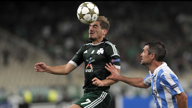 Charis Mavrias in Champions League play-off action against Malaga