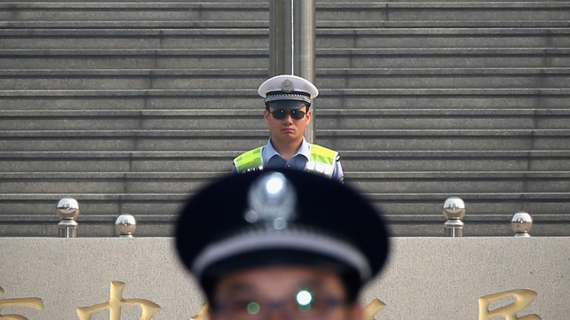 Policemen stand guard outside the court on the third day of former senior Chinese politician Bo Xilai's trial in Jinan. Policemen stand guard outside the court on the third day of former senior Chinese politician Bo Xilai's trial in Jinan.