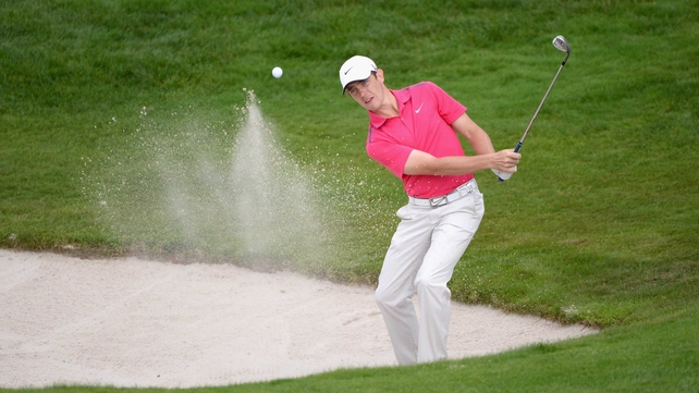 Tommy Fleetwood plays from a bunker at the 16th
