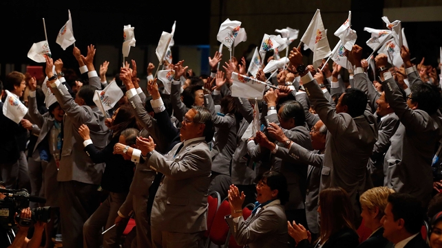 The Tokyo delegation in Buenos Aires celebrate as the city is awarded the 2020 Summer Olympic Games