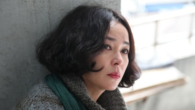 Jo Min-Soo as the mysterious Mi-Son comes to stay with her supposed son, a psychopathic debt collector